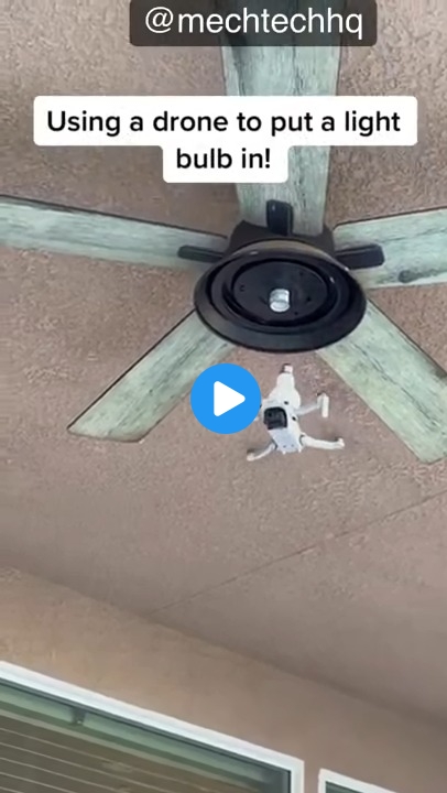 Using a drone to replace a light bulb